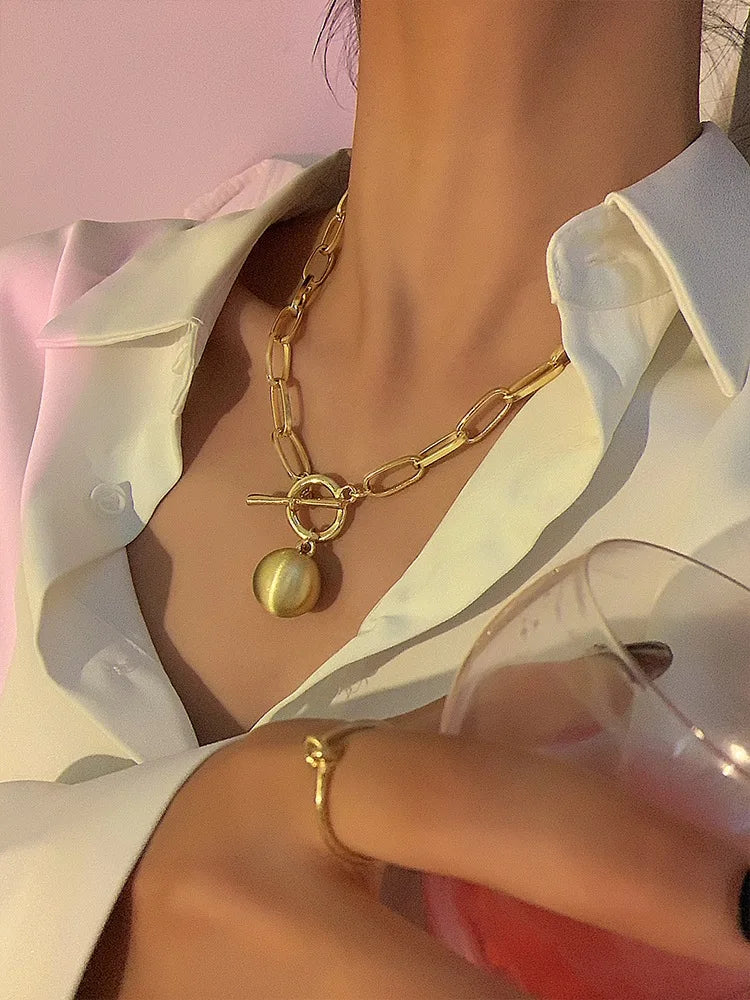 Sphere Pendant worn by model, charm necklace style