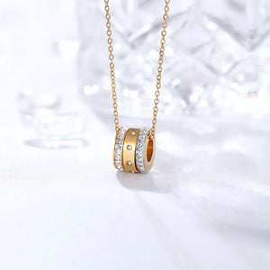 Trinity Pendant lifestyle image, gold pendant