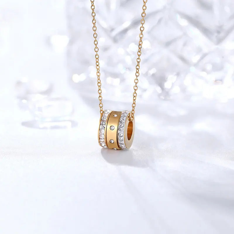 Trinity Pendant lifestyle image, gold pendant