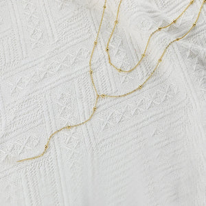 Y Necklace lifestyle image, trendy jewelry