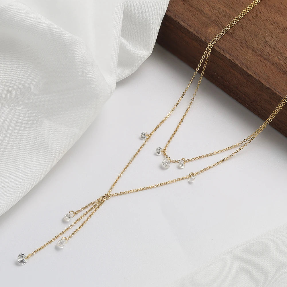 Sterling Layered worn by model, stacked chains style