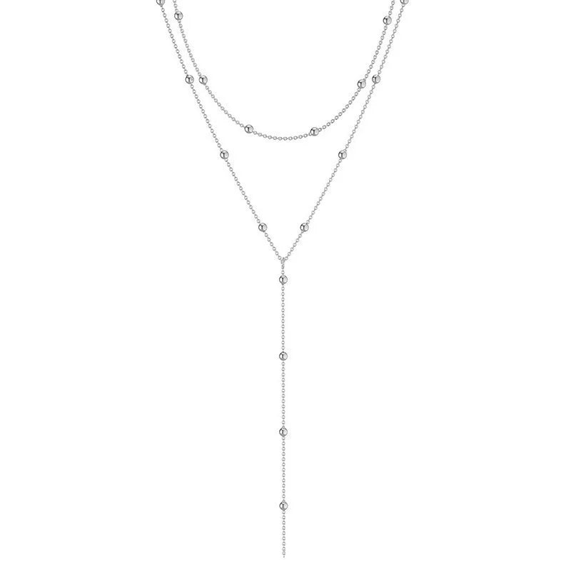 Lariat worn by model, stacked chains style