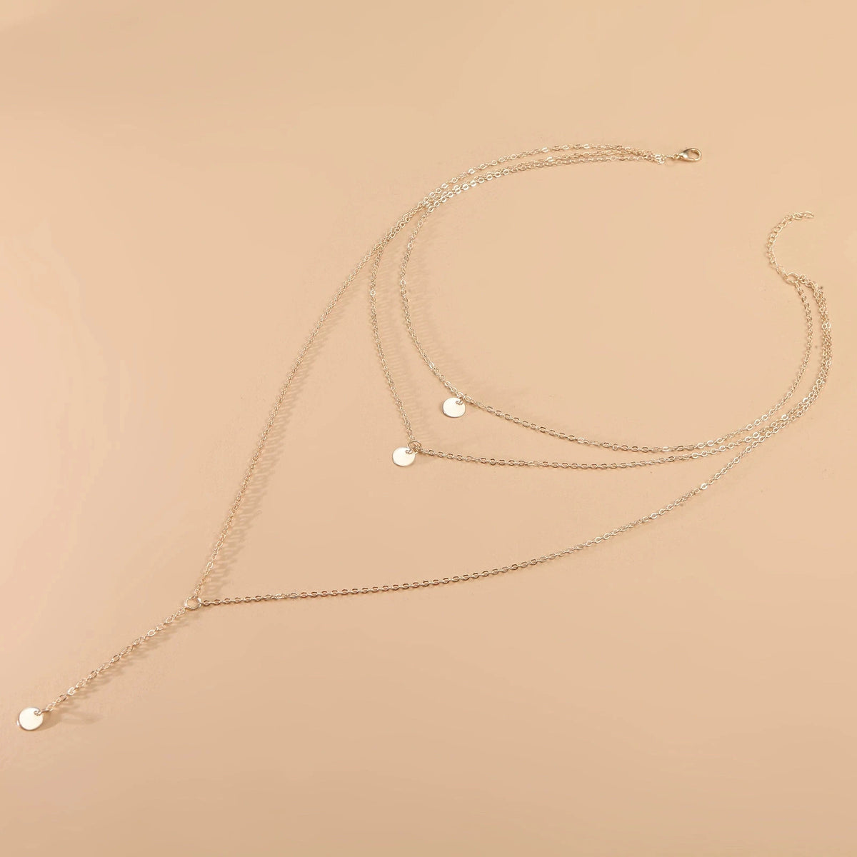 Coin Pendant worn by model, charm necklace style