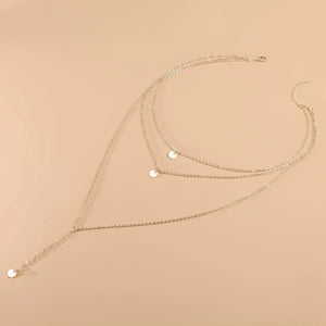 Coin Pendant worn by model, charm necklace style